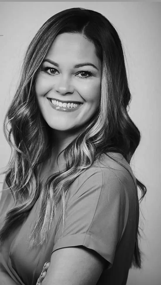 Bobbi Tanguay, founder of Love Collective Introductions, black and white studio portrait