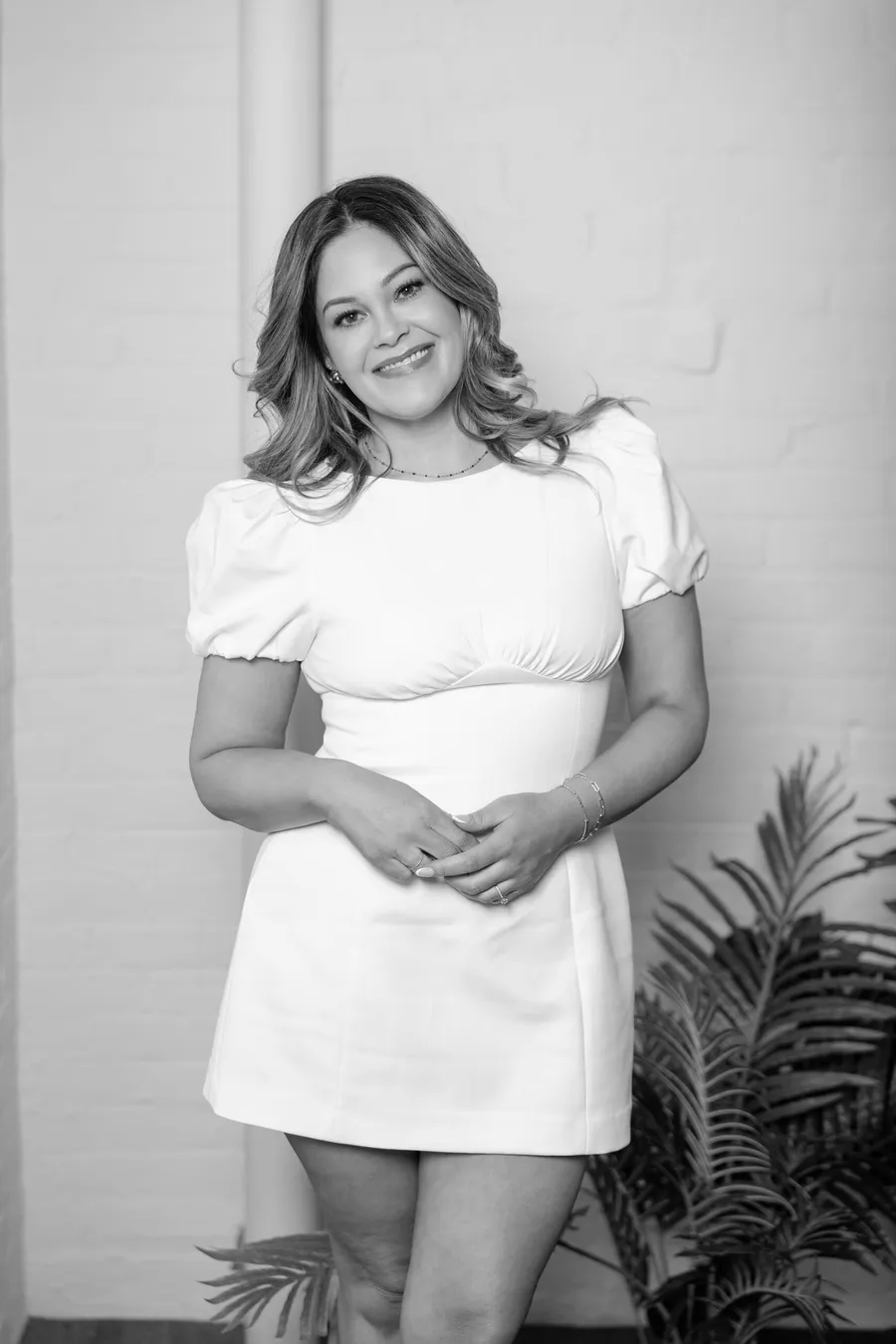 Bobbi Tanguay, founder of Love Collective Introductions, standing in the studio